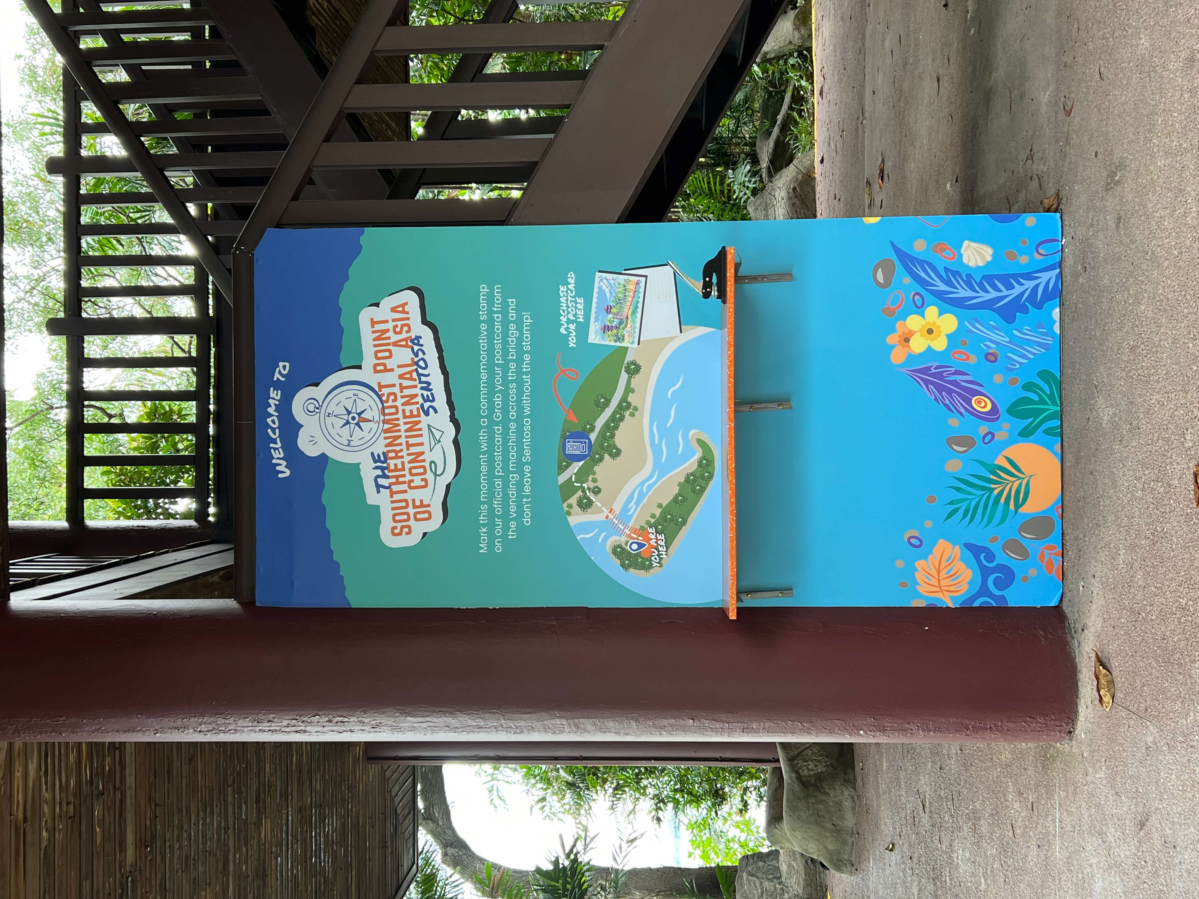 Green information board against brown background
